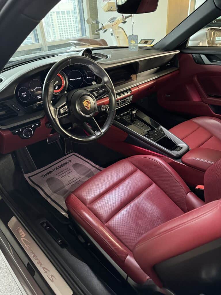 Porsche interior detailed by Elite Luxe Auto Detailing in Chicago – premium mobile car detailing and leather care.