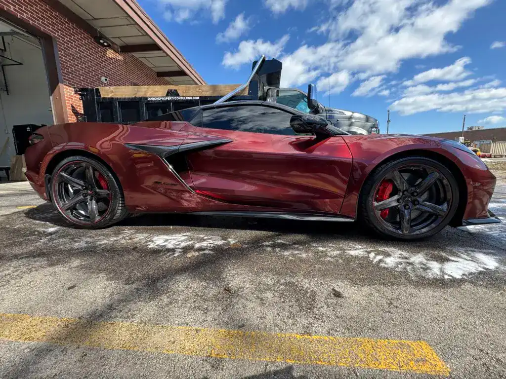 "Red Chevrolet Corvette C8 with full carbon fiber package after a premium ceramic coating and detailing by Elite Luxe Auto Detailing in Chicago."