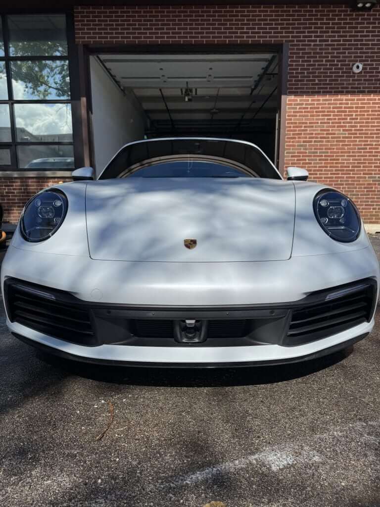 Ceramic coating application on a luxury vehicle by Elite Luxe Auto Detailing in Chicago